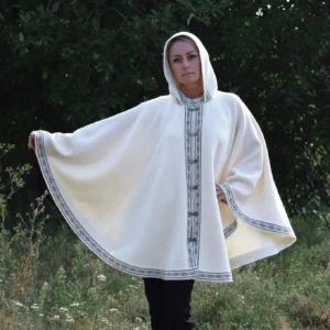 White Woolen poncho with Fair Isle pattern Plain Nordic Icelandic cape on the Norwegian clasps